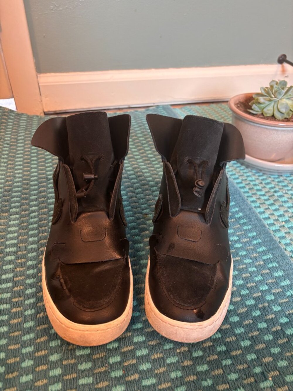 one-of-a-kind RARE NIKE designer high-tops. Toggle closure. Custom leatherwork.